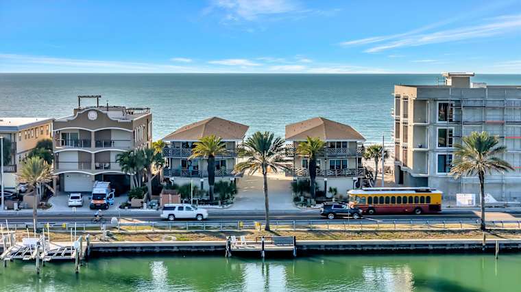Waterfront street with docks and coastal charm