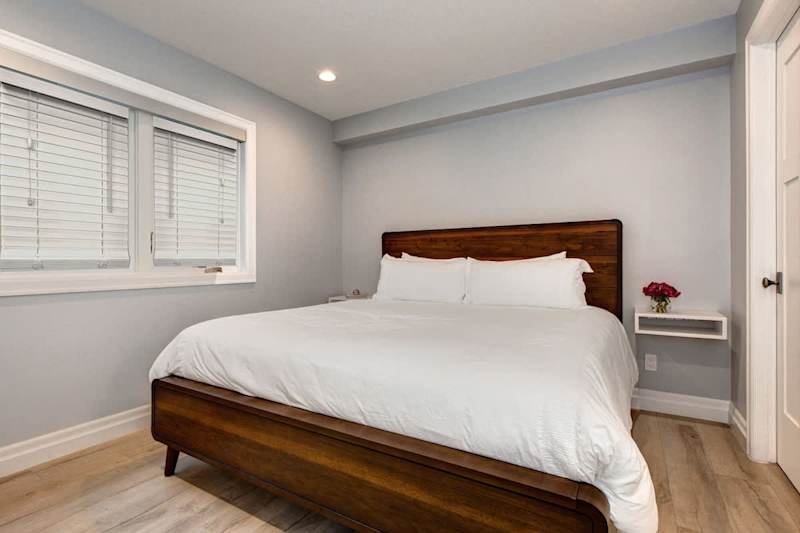 Bedroom 4 | Lower Level, King Bed, TV, Closet, Full Ensuite Bathroom with Shower | Abode at First Chair