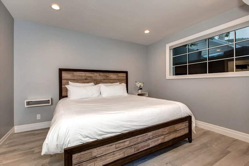 Bedroom 2 | Main Level, King Bed, Walk In Closet, Full Ensuite Bathroom with Shower/Tub Combo | Abode at First Chair