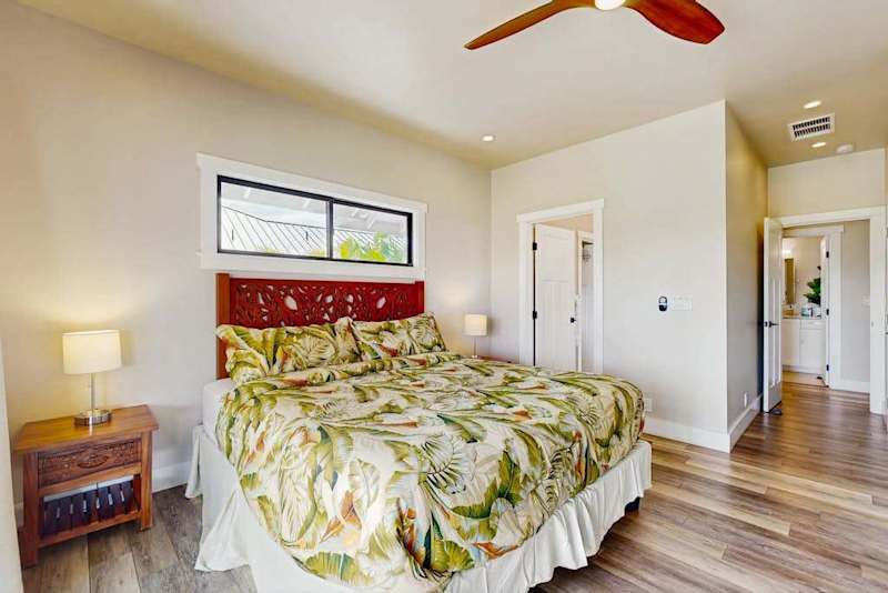 Spacious Primary Suite with Custom Wooden Headboard & Ensuite Access