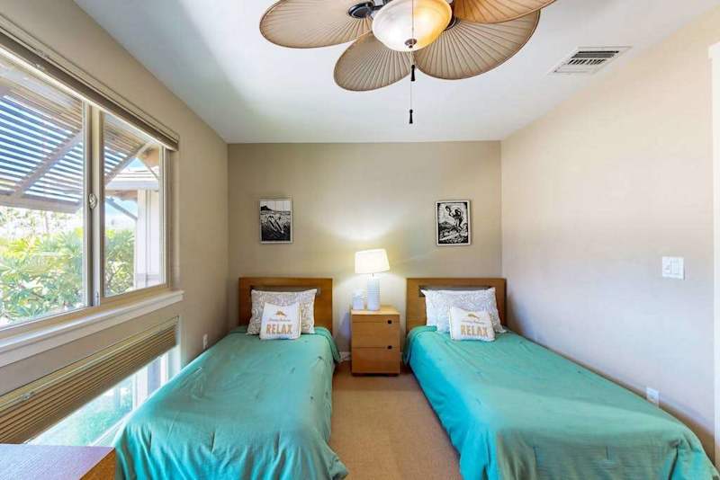 Guest bedroom with two twin beds.