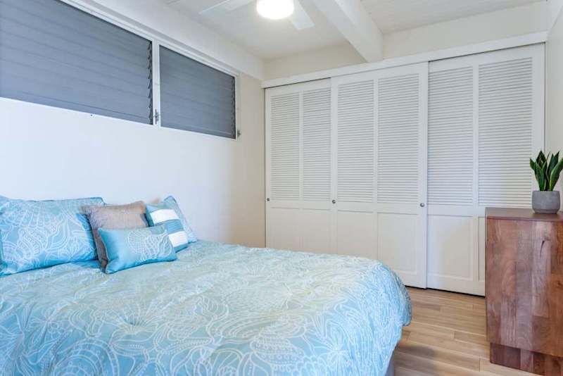 Comfortable Bed, Large Sliding Closet, Wooden Dresser & Ceiling Fan