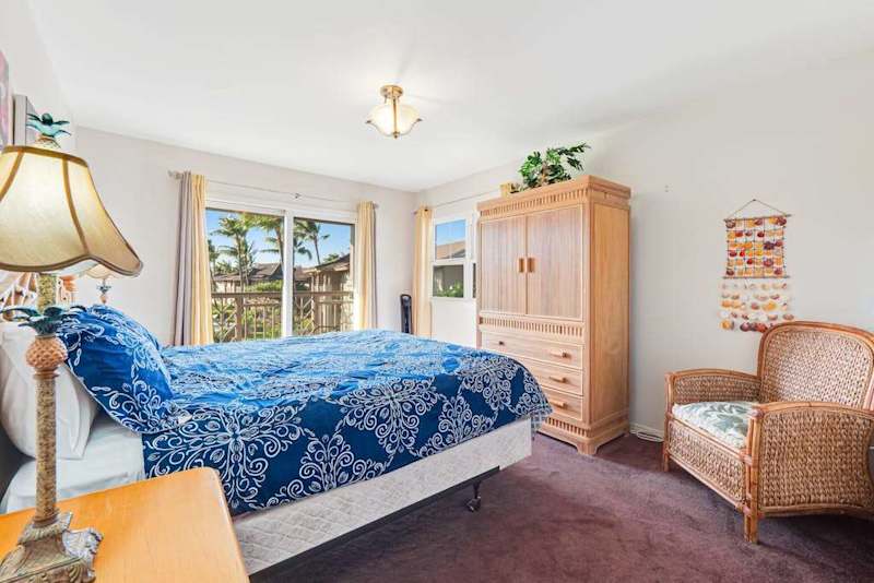 Master bedroom with king bed, flat screen tv, and your own private lanai.