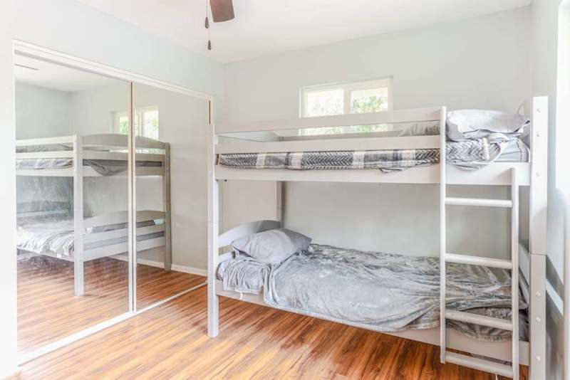 Great room for kids with these bunk beds so two twin beds.  Leaves lots of room for space for them to spread out in this room.