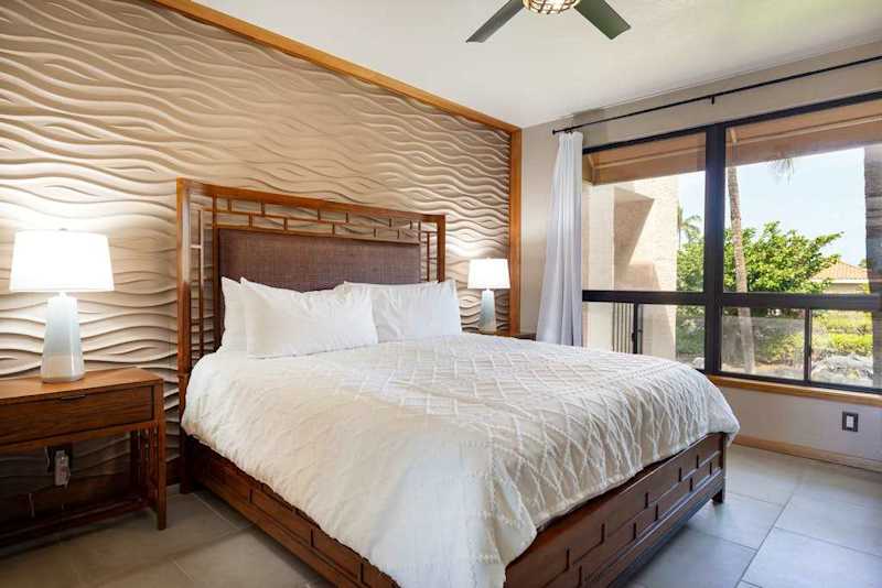 Bright Primary Bedroom With Tropical Character