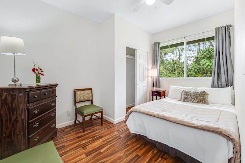 Guest room with queen bed.