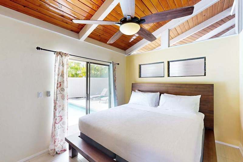 Haven Primary King Suite with Vaulted Ceilings & Patio Access