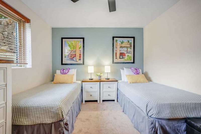 Two cozy twin beds make this room ideal for families or friends