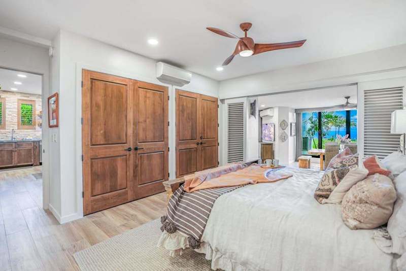 Cozy guest bedroom with ample storage and natural light