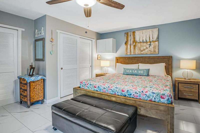 Bright Primary Bedroom With Coastal Charm