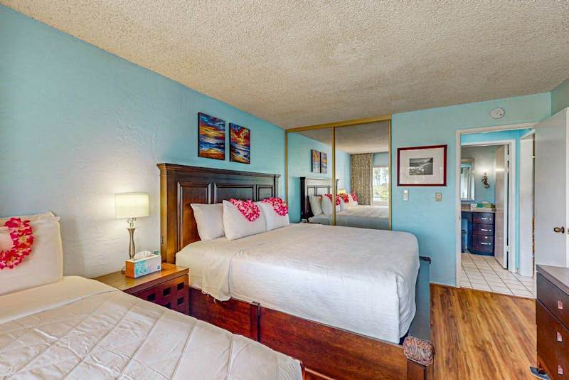 Master bedroom with king bed, single bed and a fold up crib for your use.