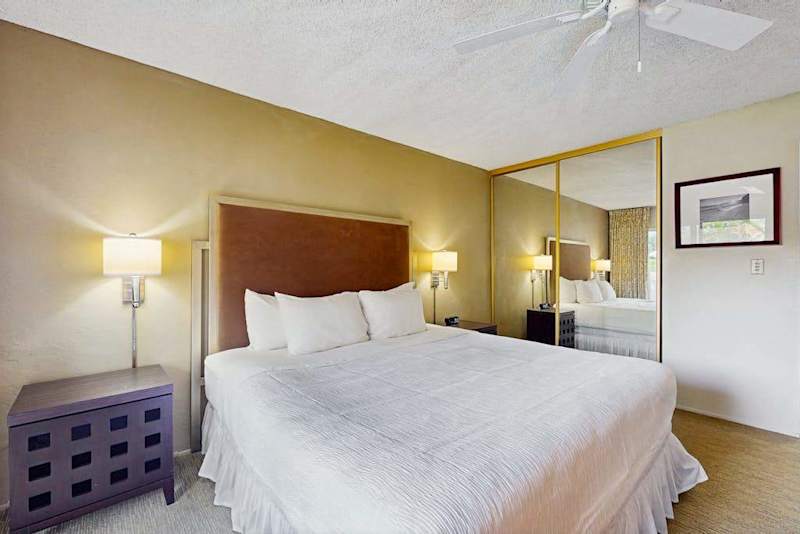 Wake Up to Tropical Views from Your King Bed