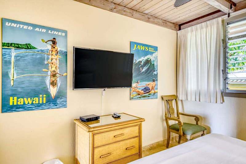 Bedroom With Smart TV And Island Comfort