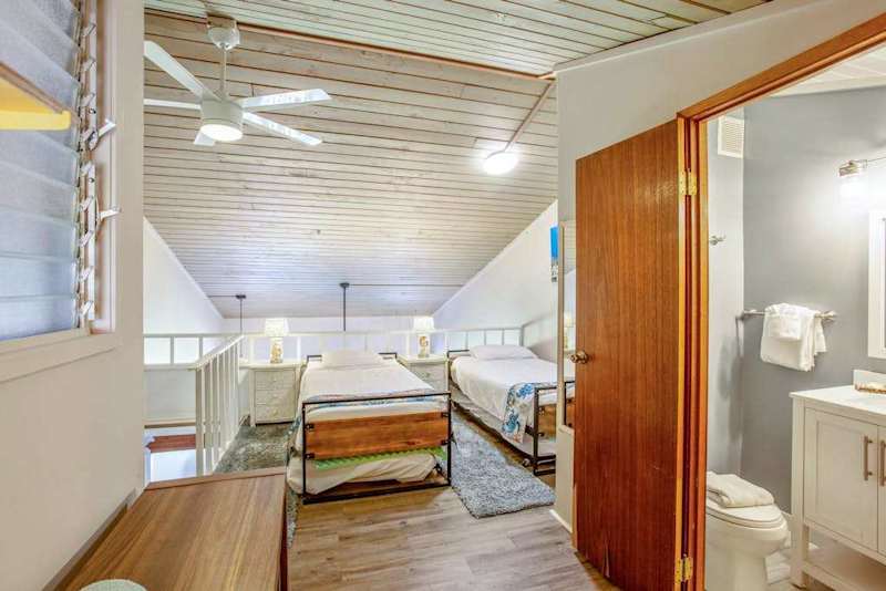 Loft area with two twin beds plus a bathroom