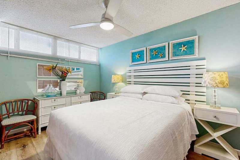 Primary Suite with queen bed and en suite bathroom.