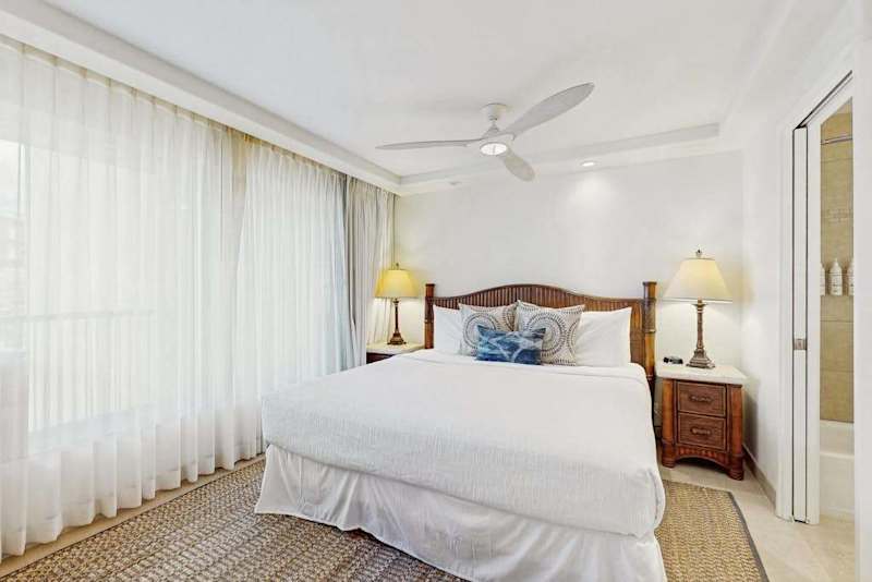 Comfortable king bed with soft linens.