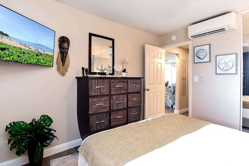 Luxurious queen size bed with ceiling fan for comfort and flat screen tv so that you can unwind.