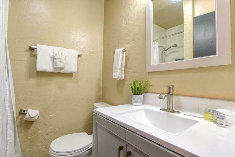 Second bathroom with matching style and natural light