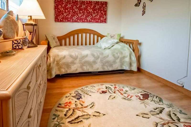 Enjoy restful nights in this cozy bedroom designed for comfort relaxation and peaceful stays