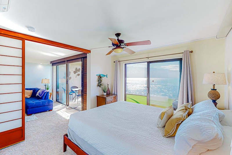 Master bedroom with a private lanai access for fabulous ocean views.
