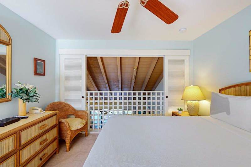 Relax in a welcoming bedroom with island-inspired style