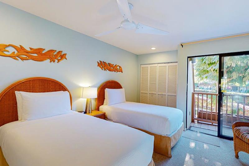 Rest easy in a comfortable bedroom with two beds