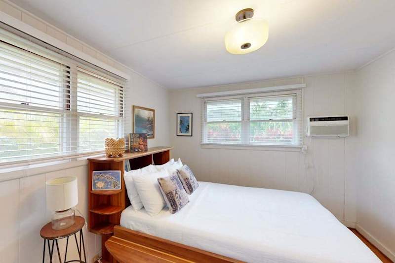 Master bedroom features a comfortable queen bed for restful nights every stay