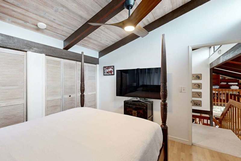 End the day comfortably in this inviting queen bedroom with a Smart TV.