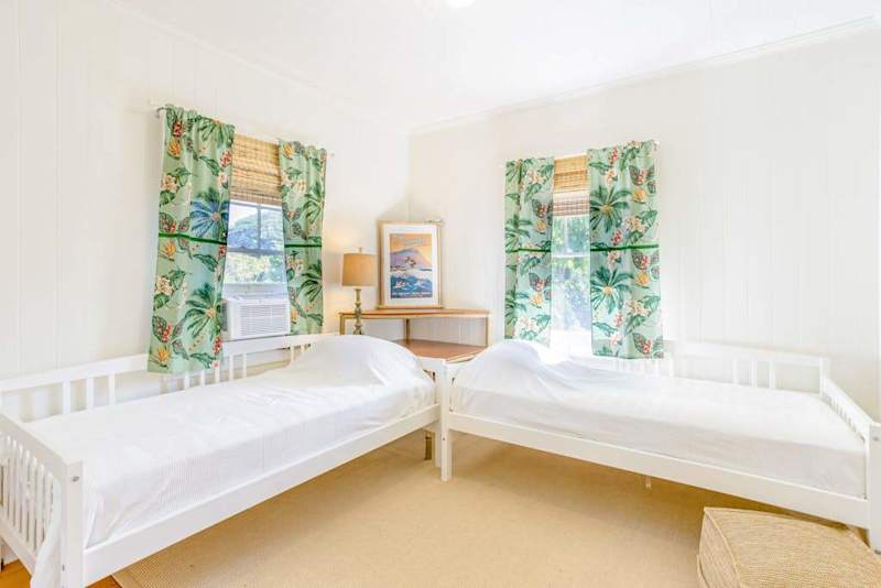 Relax and recharge in Cottage B's welcoming room with twin beds together