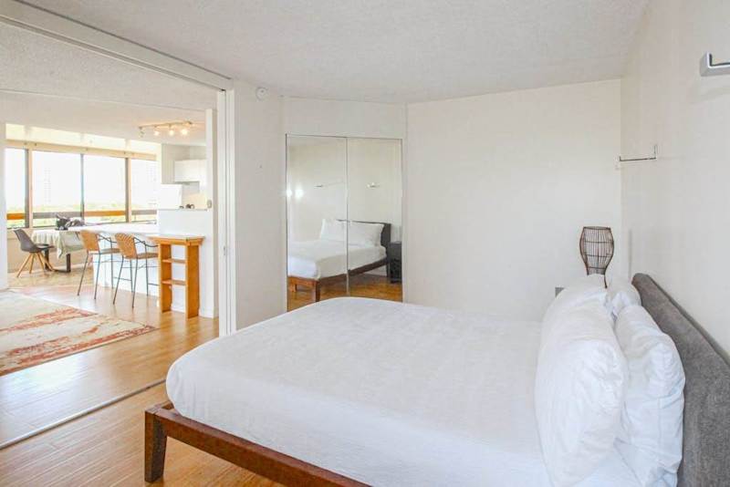 Relax and recharge in a comfortable bedroom featuring a queen-size bed for a restful stay.