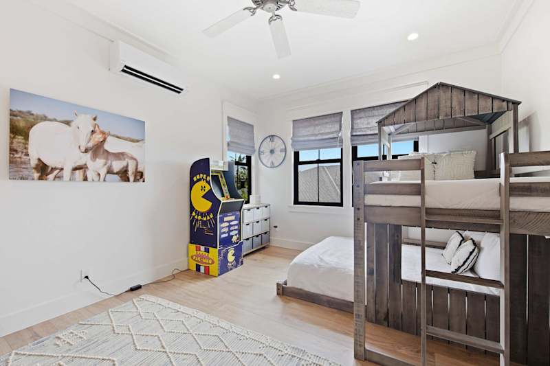 Room with retro gaming and bunk bed