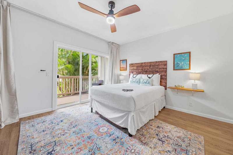 Queen Bedroom with Lanai Access and Coastal Decor