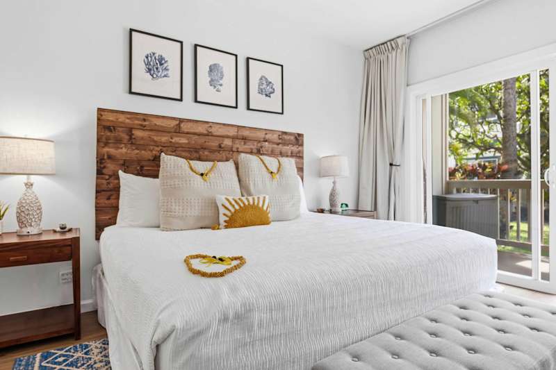 King Bed with Rustic Wood Headboard and Sunburst Pillow