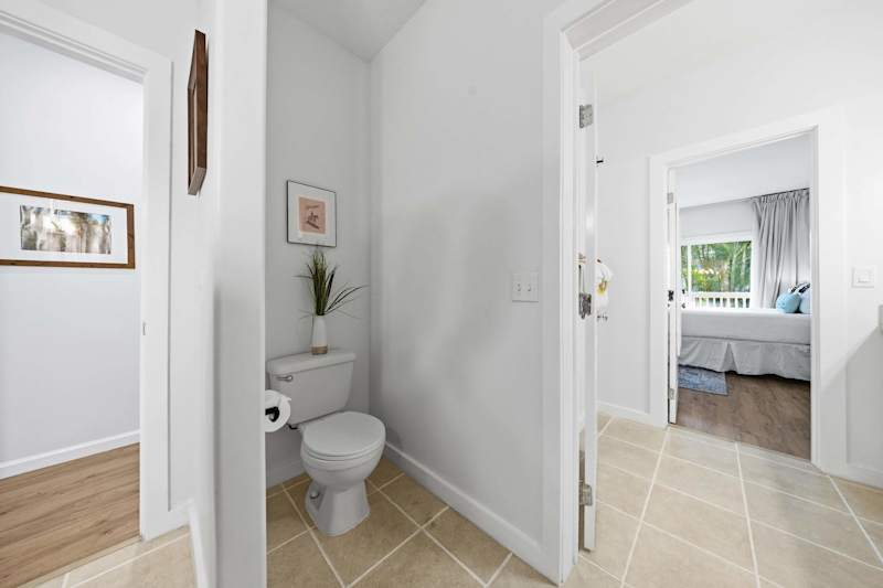 Half Bath with View into Bedroom