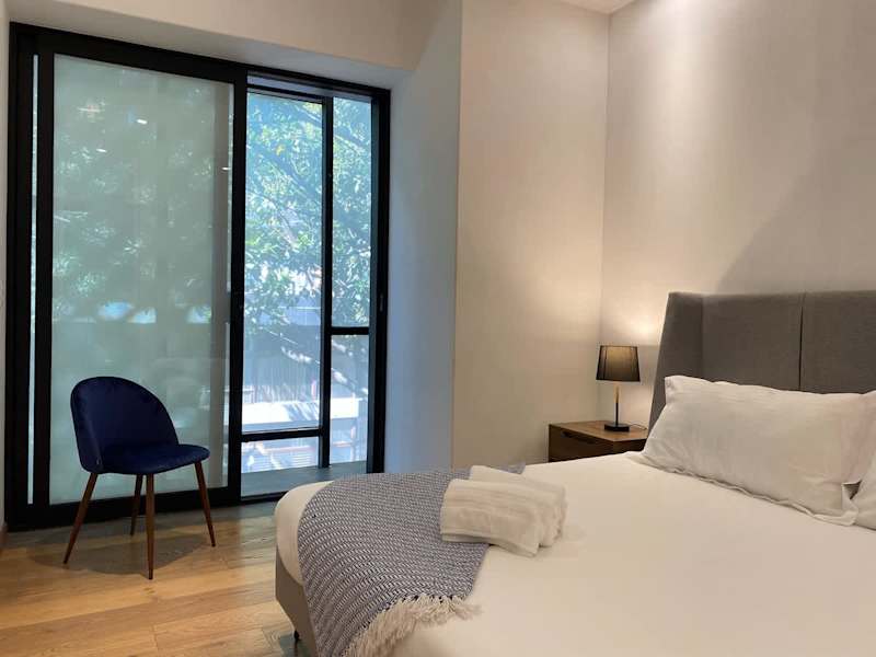 1st bedroom with outdoor view