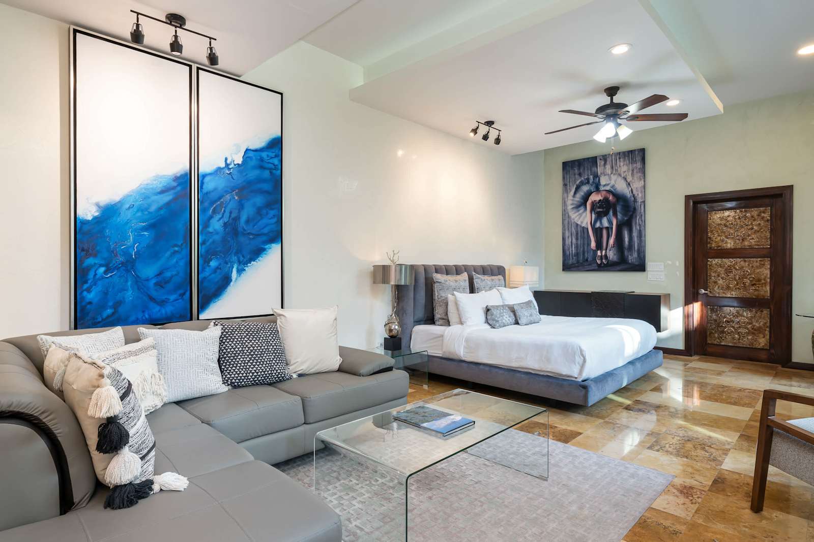 Primary suite with king bed and sitting area