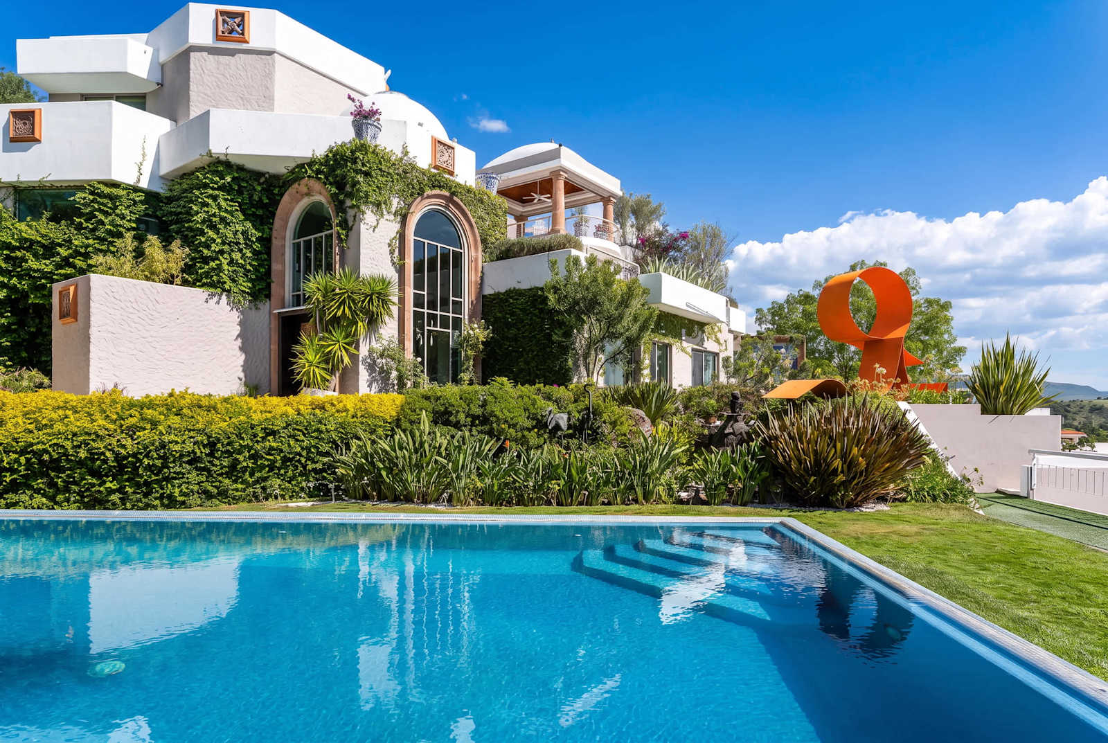 Shared outdoor pool and garden terrace