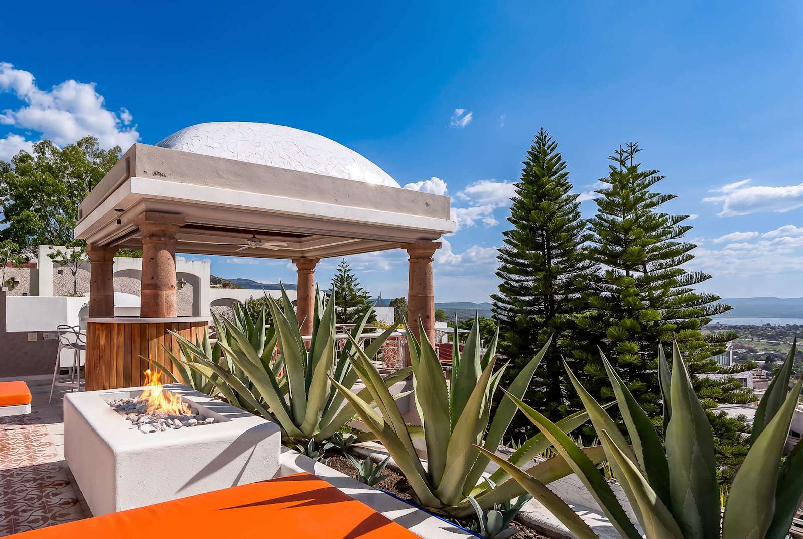 Private terrace with hot tub, fire pit, outdoor dining and panoramic city views