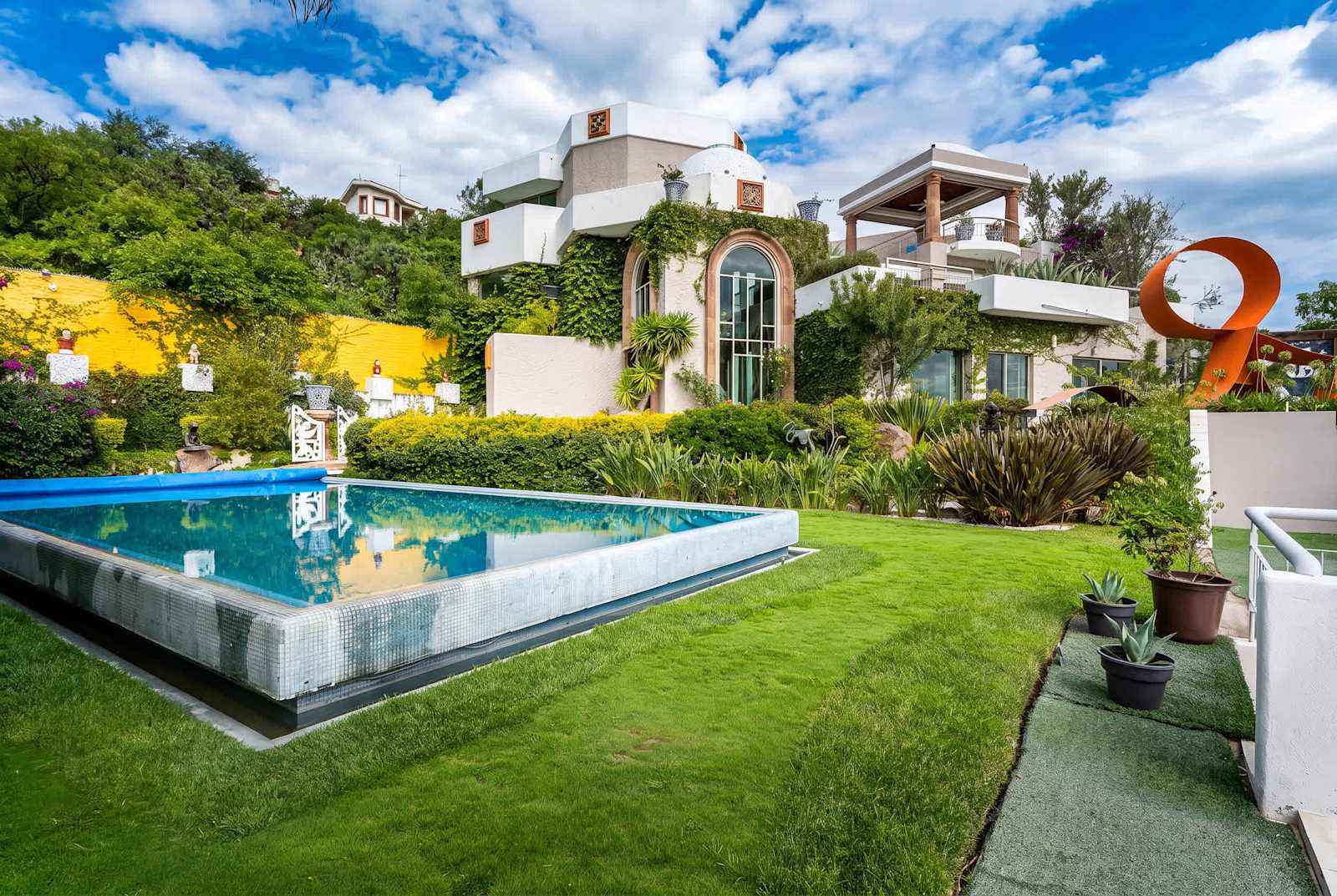 Shared infinity pool and garden terrace