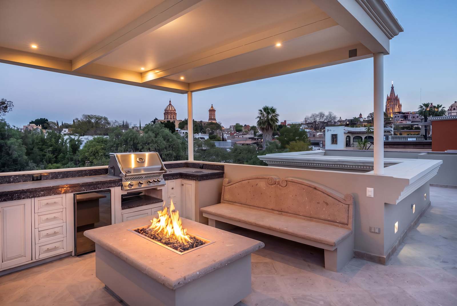 Private rooftop with outdoor kitchen and fire pit