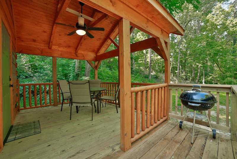 Private front deck with charcoal grill and outdoor seating
