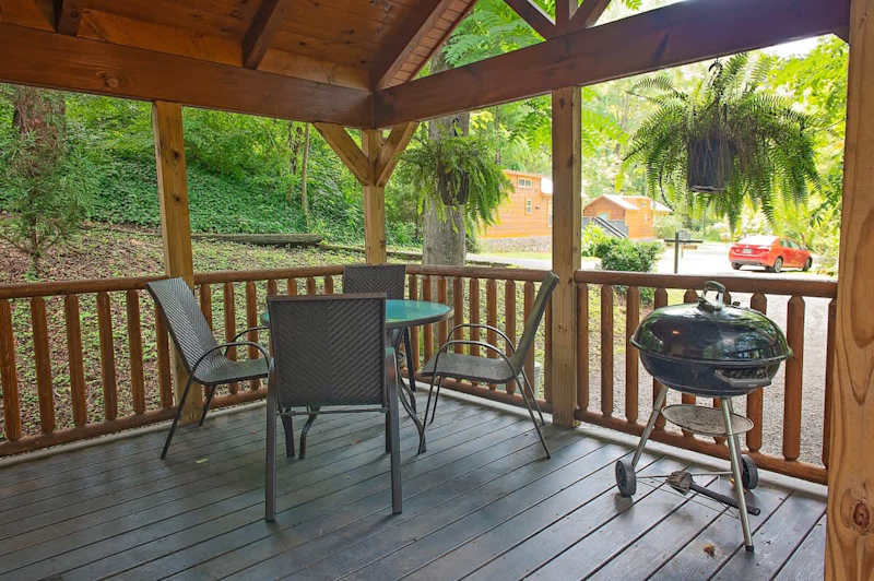 Front Porch with charcoal grill and dining area