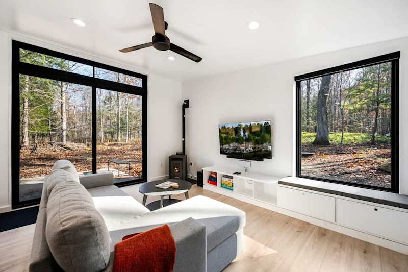 Welcome to Spring Lane, a cozy cabin tucked away in the tranquil woods of Egg Harbor, WI. This 1-bedroom, 1-bathroom getaway is perfect for small families or couples looking for a peaceful escape near Door County’s attractions. Nearby, Frank E. Murph