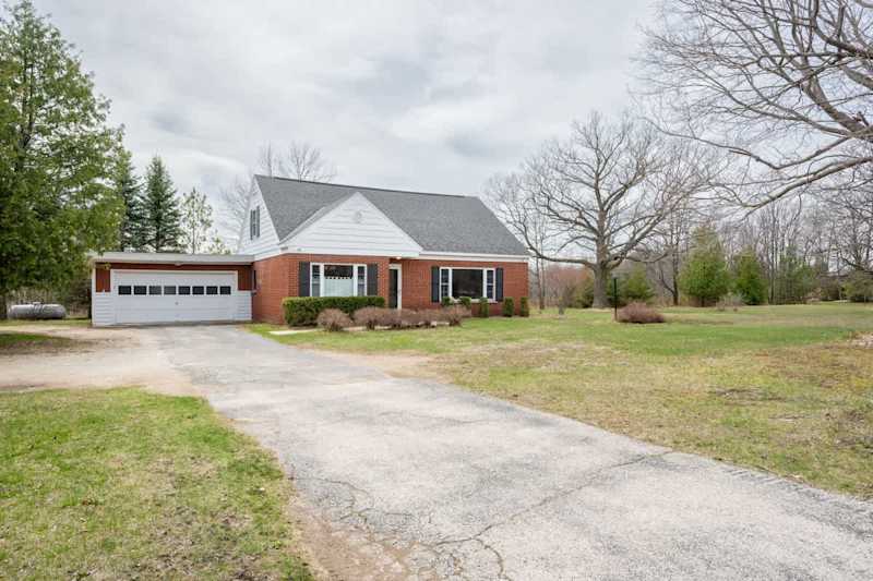 Located a minute from the heart of downtown Egg Harbor, Cherry Brick Cottage is a lovingly restored 3-bedroom, 2-bathroom home that blends Door County history with thoughtful modern touches.