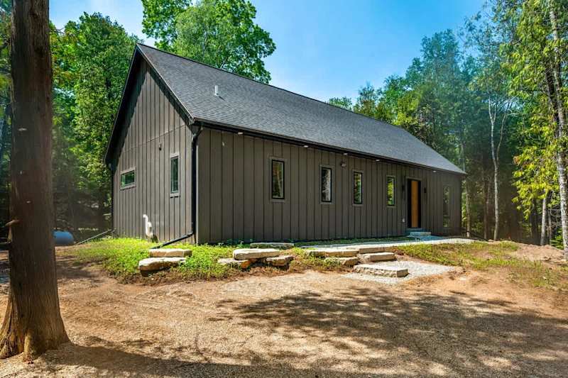 DoCo Abode is a newly built 3-bedroom, 2.5-bathroom retreat that combines impeccable design with high-end finishes. Located just one mile from downtown Egg Harbor, this home offers the perfect balance of seclusion and convenience, making it an ideal