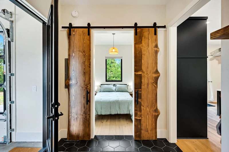 Off the main entrance you'll find a cozy den converted for additional sleeping arrangements or relaxation.