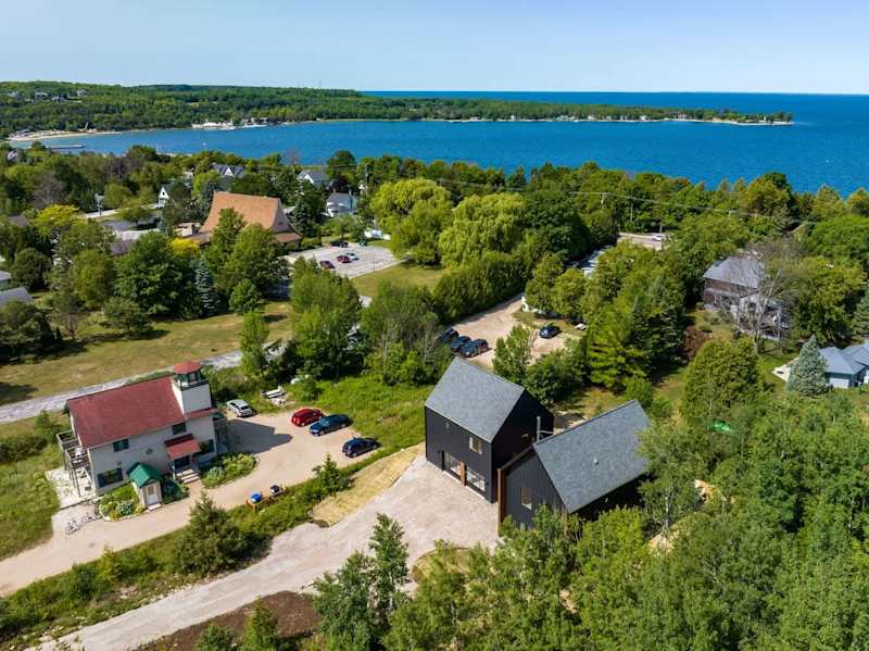 Welcome to the Nordica House, a modern and design-driven retreat in the heart of Egg Harbor. With 4 bedrooms and 3 bathrooms, this spacious property offers a perfect blend of style and comfort.