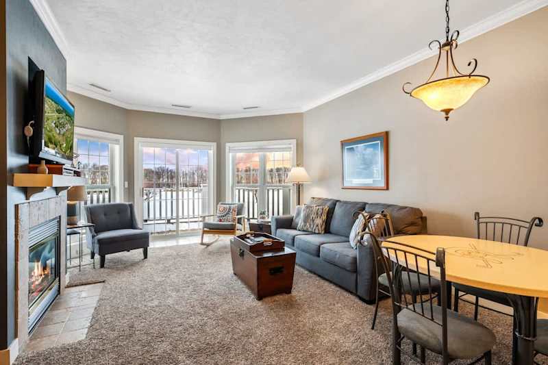 Relax in cozy comfort with an indoor fireplace and sleeper sofa for additional guests. Enjoy views of the grounds and outdoor seating on your own private deck/patio.