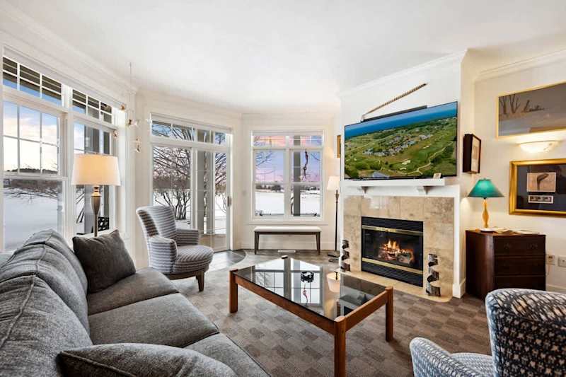 Relax in cozy comfort with an indoor fireplace and sleeper sofa for additional guests. Enjoy views of the grounds and outdoor seating on your own private deck/patio.