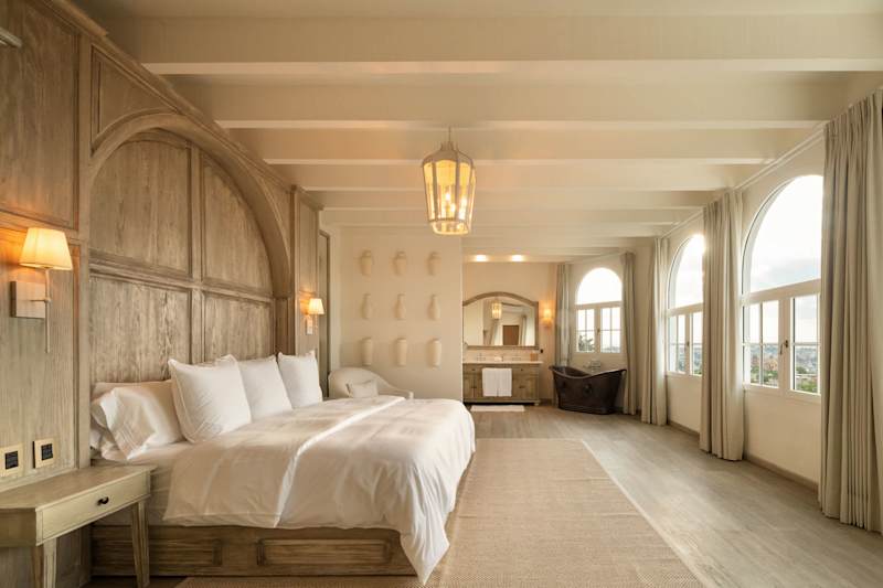 Suite 4: King bed, ensuite bathroom with shower and copper soaking tub, city and church views